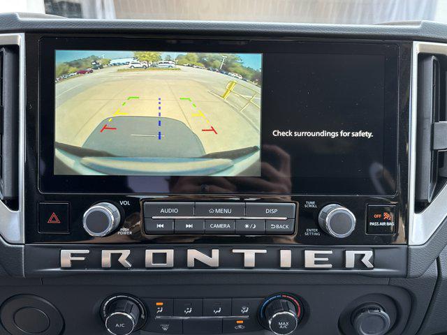 Photo of 2025 Glacier White Nissan Frontier