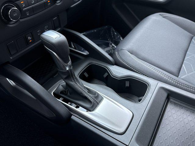 Photo of 2025 Glacier White Nissan Frontier