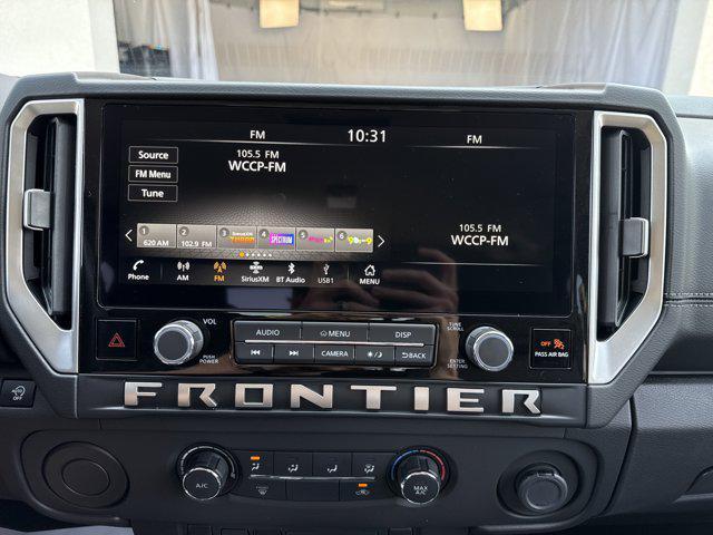 Photo of 2025 Glacier White Nissan Frontier
