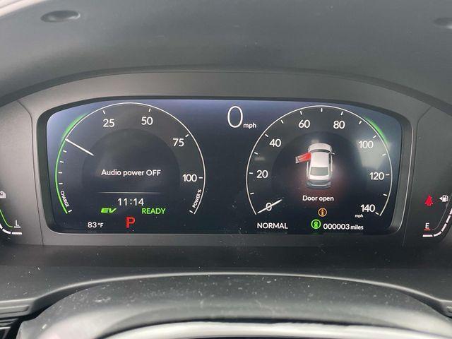 Photo of 2025 Boost Blue Pearl Honda Civic Hybrid