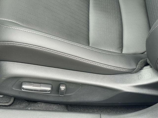 Photo of 2025 Boost Blue Pearl Honda Civic Hybrid