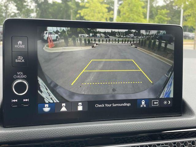 Photo of 2025 Boost Blue Pearl Honda Civic Hybrid