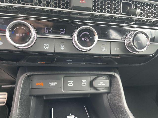 Photo of 2025 Boost Blue Pearl Honda Civic Hybrid
