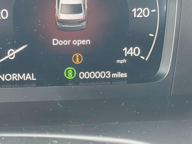 Photo of 2025 Boost Blue Pearl Honda Civic Hybrid