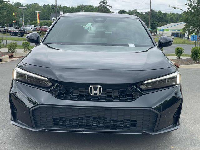 Photo of 2025 Boost Blue Pearl Honda Civic Hybrid
