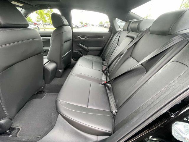 Photo of 2025 Boost Blue Pearl Honda Civic Hybrid