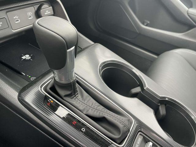 Photo of 2025 Boost Blue Pearl Honda Civic Hybrid