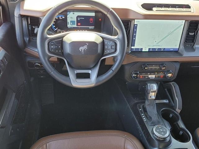 Photo of 2024 AZURE GRAY MET TRI-COAT Ford Bronco