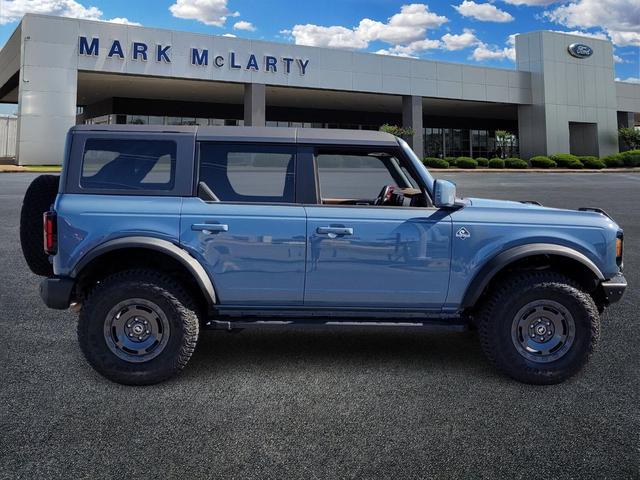 Photo of 2024 AZURE GRAY MET TRI-COAT Ford Bronco
