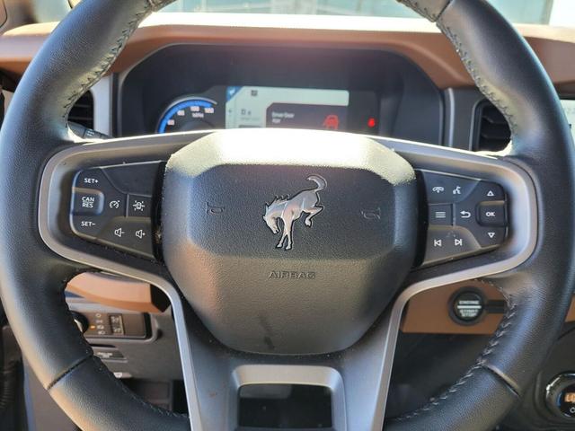 Photo of 2024 AZURE GRAY MET TRI-COAT Ford Bronco