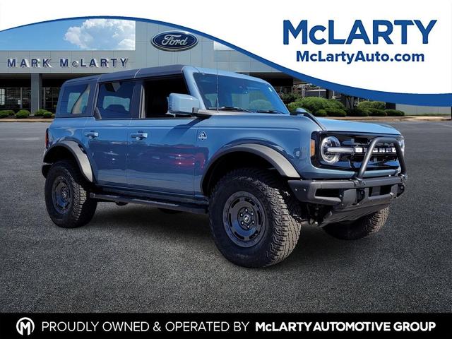 Photo of 2024 AZURE GRAY MET TRI-COAT Ford Bronco