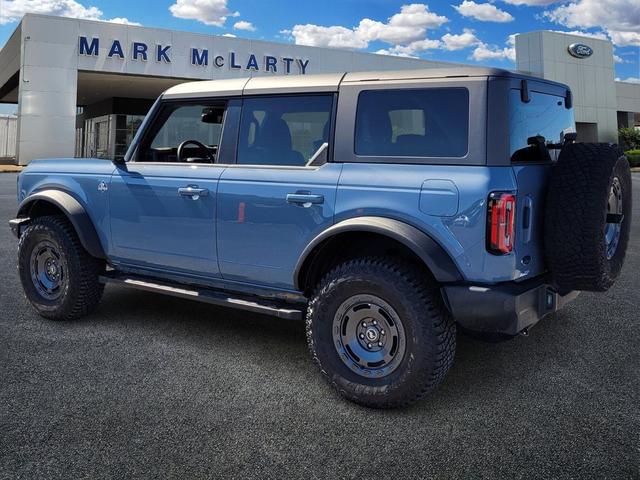 Photo of 2024 AZURE GRAY MET TRI-COAT Ford Bronco