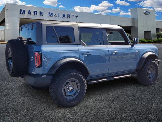 Photo of 2024 AZURE GRAY MET TRI-COAT Ford Bronco