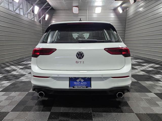 Photo of 2024 Opal White Pearl Volkswagen Golf GTI