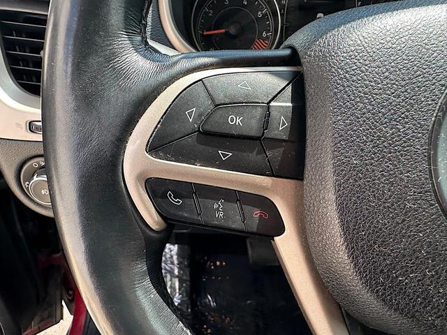 Photo of 2015 Deep Cherry Red Crystal Pearlcoat Jeep Cherokee