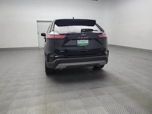 Photo of 2023 Agate Black Metallic Ford Edge
