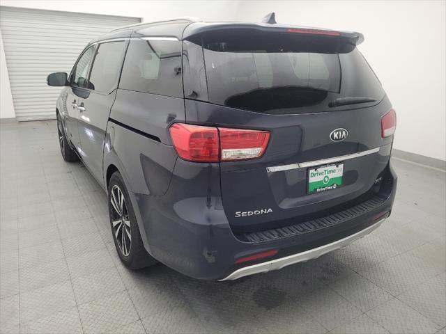 Photo of 2015 Deep Formal Blue Kia Sedona