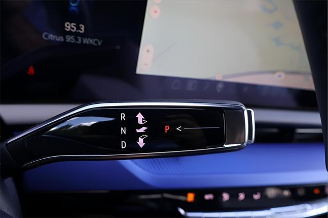 Photo of 2025 Radiant Red Tintcoat Cadillac OPTIQ