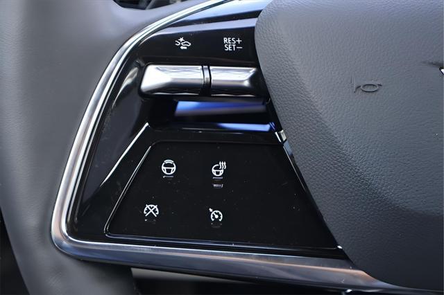 Photo of 2025 Radiant Red Tintcoat Cadillac OPTIQ