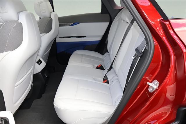 Photo of 2025 Radiant Red Tintcoat Cadillac OPTIQ