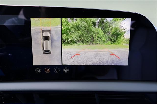 Photo of 2025 Radiant Red Tintcoat Cadillac OPTIQ