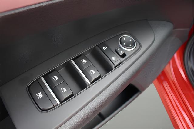 Photo of 2023 Fire Orange Kia Forte