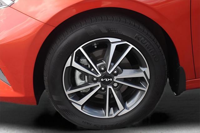 Photo of 2023 Fire Orange Kia Forte