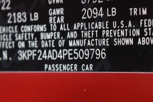 Photo of 2023 Fire Orange Kia Forte