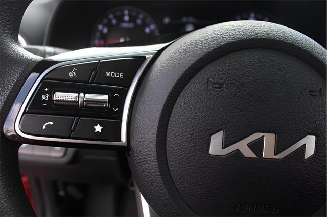 Photo of 2023 Fire Orange Kia Forte