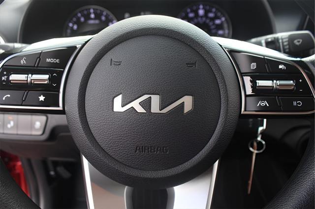Photo of 2023 Fire Orange Kia Forte