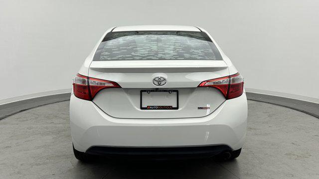 Photo of 2015 Super White Toyota Corolla