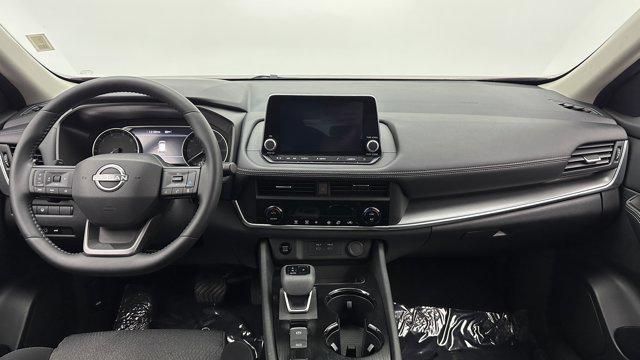 Photo of 2025 Scarlet Ember Tintcoat Nissan Rogue