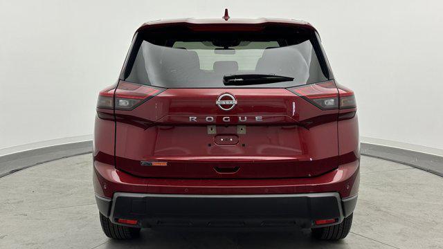 Photo of 2025 Scarlet Ember Tintcoat Nissan Rogue