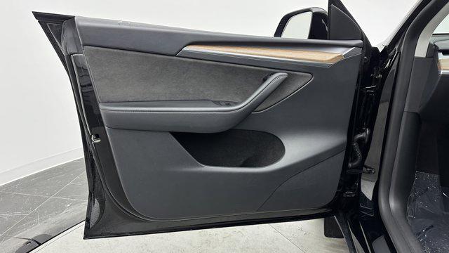 Photo of 2024 Stealth Grey Tesla Model Y