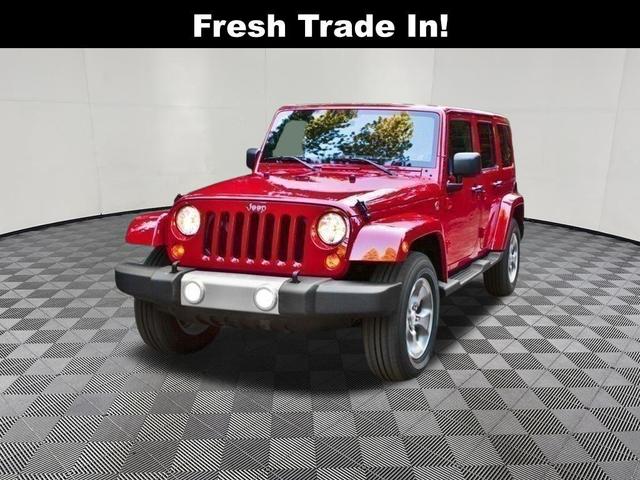 Photo of 2016 Bright White Clearcoat Jeep Wrangler Unlimited