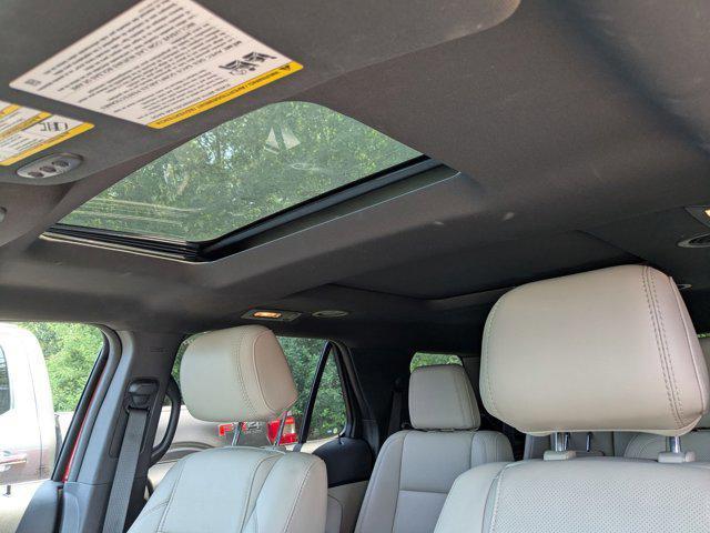 Photo of 2014 Ruby Red Metallic Tinted Clearcoat Ford Explorer