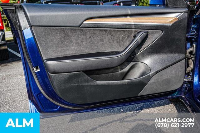 Photo of 2022 Deep Blue Metallic Tesla Model 3
