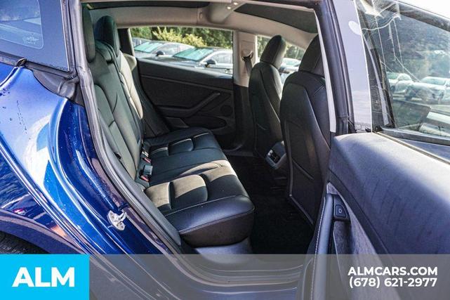 Photo of 2022 Deep Blue Metallic Tesla Model 3