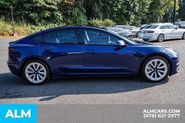 Photo of 2022 Deep Blue Metallic Tesla Model 3