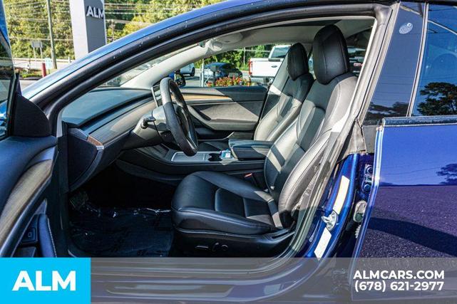 Photo of 2022 Deep Blue Metallic Tesla Model 3