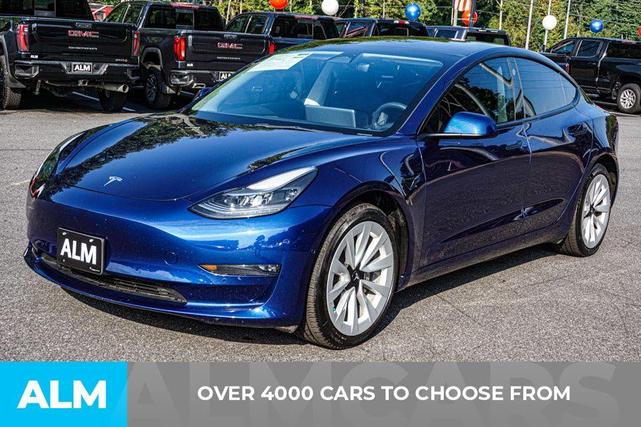Photo of 2022 Deep Blue Metallic Tesla Model 3