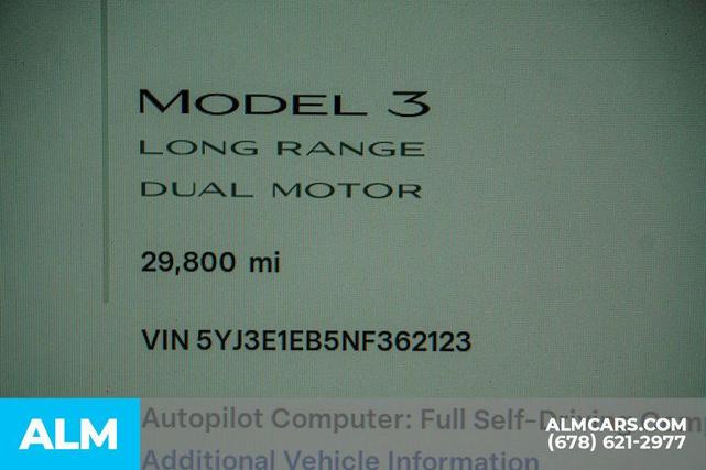 Photo of 2022 Deep Blue Metallic Tesla Model 3
