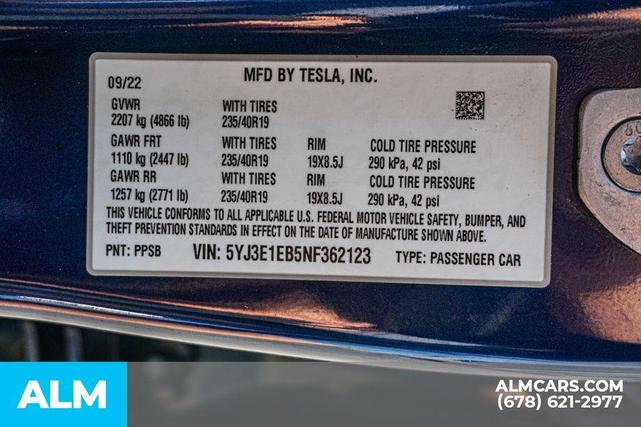 Photo of 2022 Deep Blue Metallic Tesla Model 3