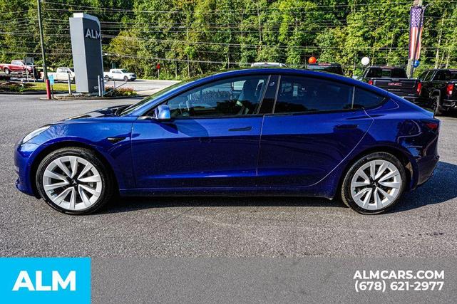 Photo of 2022 Deep Blue Metallic Tesla Model 3