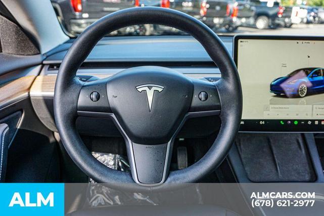 Photo of 2022 Deep Blue Metallic Tesla Model 3