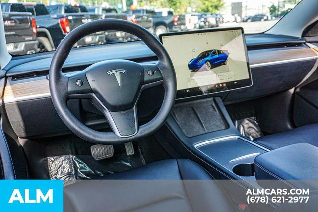 Photo of 2022 Deep Blue Metallic Tesla Model 3