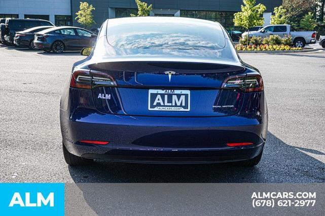 Photo of 2022 Deep Blue Metallic Tesla Model 3