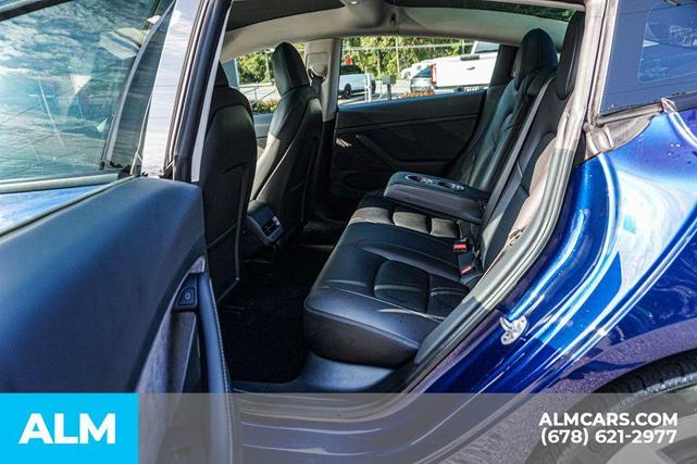 Photo of 2022 Deep Blue Metallic Tesla Model 3
