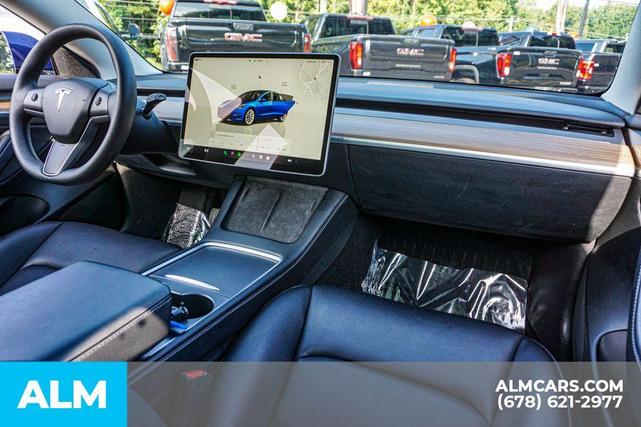 Photo of 2022 Deep Blue Metallic Tesla Model 3