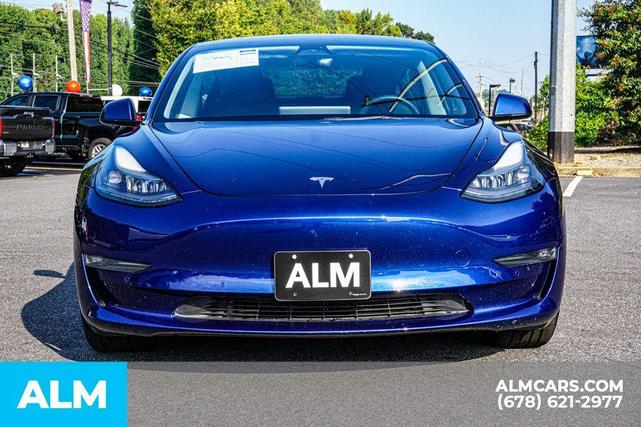 Photo of 2022 Deep Blue Metallic Tesla Model 3